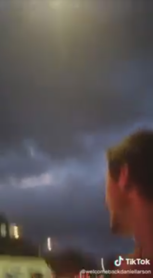 Screenshot of Daniel Larson looking at the storm.png