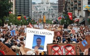 A photoshop created by u/steviecarn on the r/SecretDanielLarson showing protesters with anti Daniel Larson picket signs. Used during the May 2nd, 2023 protests/riots.